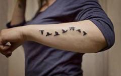 Татуировка на руке, спине и других участках тела: толкование сонников